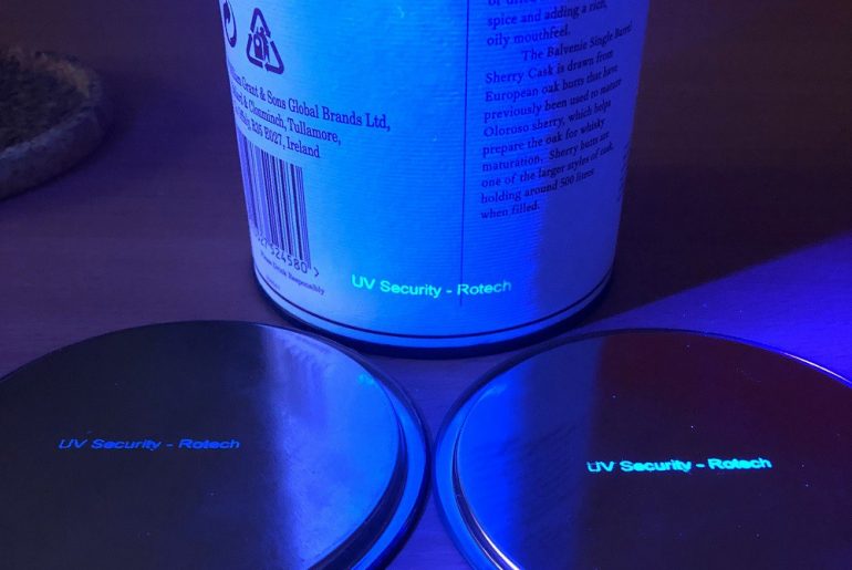 Anti-counterfeit UV security ink printed with thermal inkjet printer onto cardboard tube drink packaging