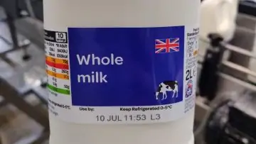 Milk bottle label printed with BBD and batch with thermal inkjet