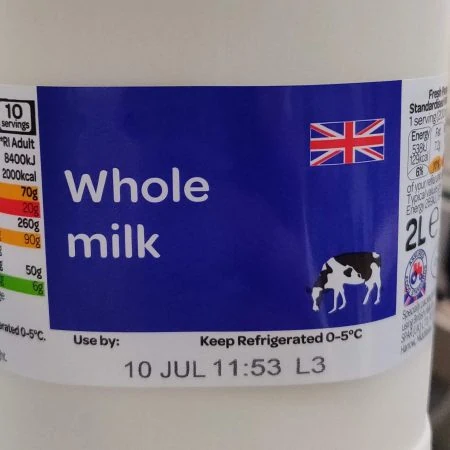 Milk bottle label printed with BBD and batch with thermal inkjet