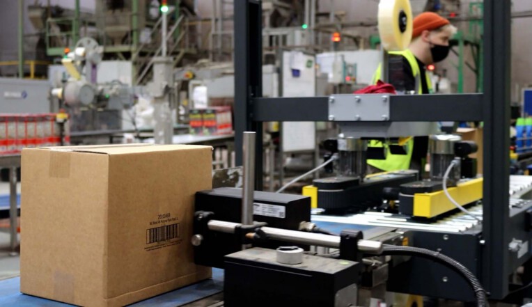 Large area printer, printing product information and barcode onto outer case
