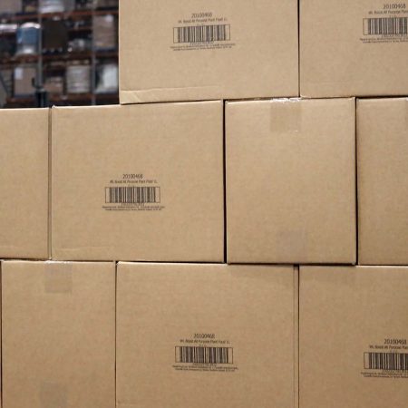 Outer case boxes stacked on pallet in warehouse