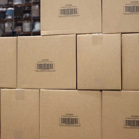 Outer case boxes stacked on pallet in warehouse