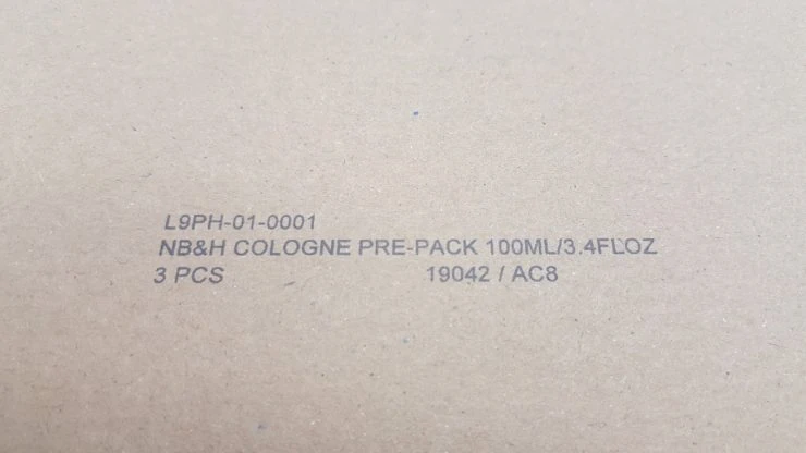 Thermal inkjet product description and batch number on candle manufacturer packaging