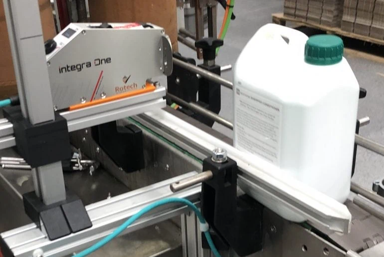 Autoglym bottle on production line being printed by Thermal Inkjet printer