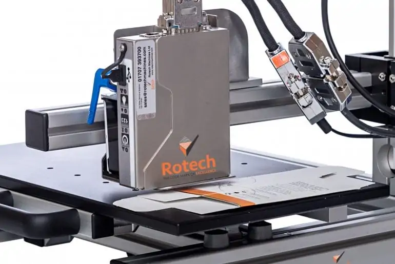 Slider rig printing onto carton