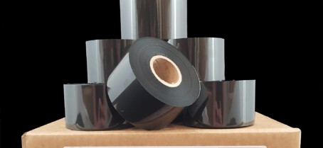 Hot foil tape piled on top of Rotech box