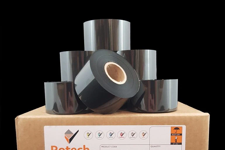 Hot foil tape piled on top of Rotech box