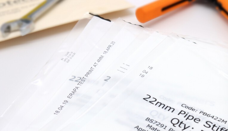 Printed batch numbers on building product pouches using TIJ printer