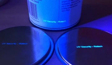 Anti-counterfeit UV security ink printed with thermal inkjet printer onto cardboard tube drink packaging