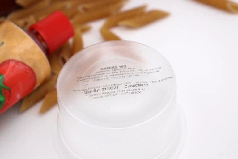 Plastic food tub printed with ingredients list using thermal inkjet printer