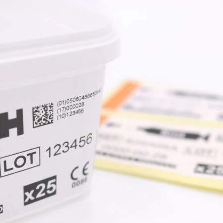 Medical tub packaging with label printed with GS1, batch and serialisation