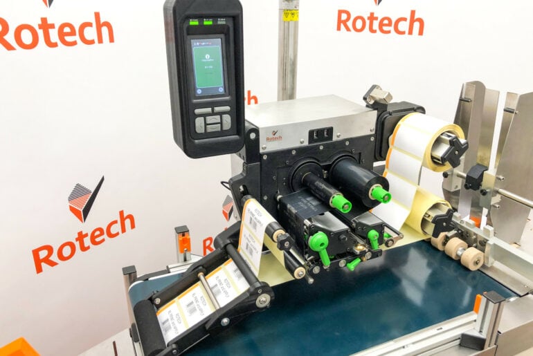 Print and Apply labelling system mounted onto Rotech's RF1 feeding system