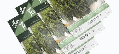 seed sachet packets printed with price and date using feeding system