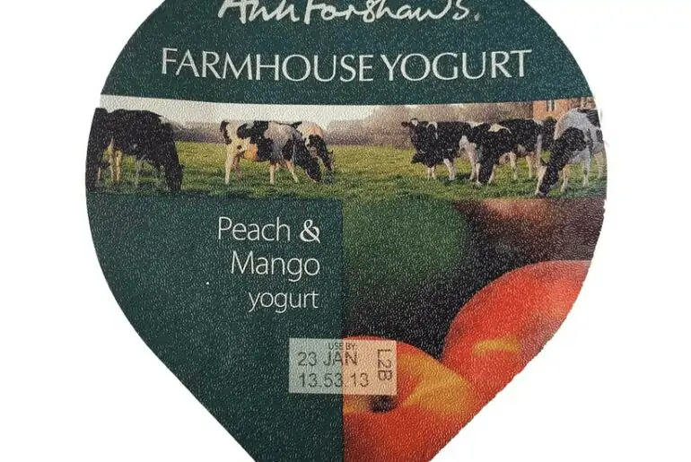 Yoghurt lid printed with batch number and use-by date using thermal inkjet