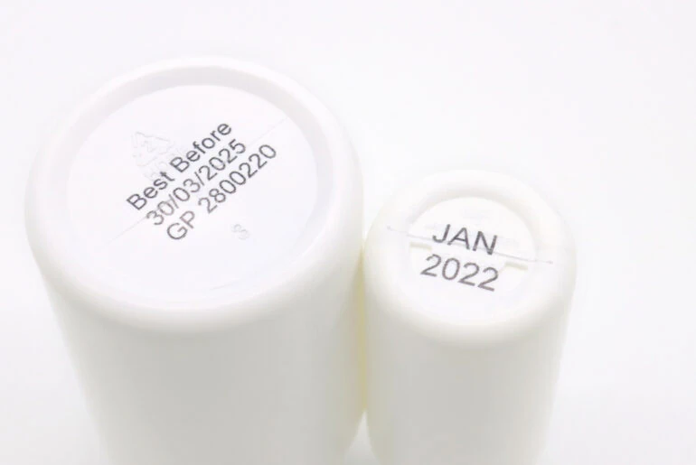 Best before and batch information coded onto white plastic bottles