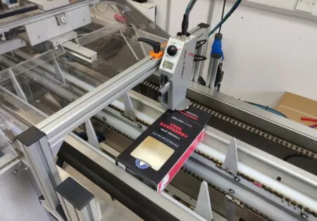 Thermal inkjet integra on carton handling machine