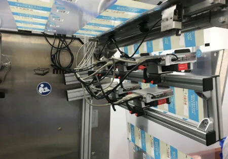 Multi-head thermal inkjet printer installation on thermoformer
