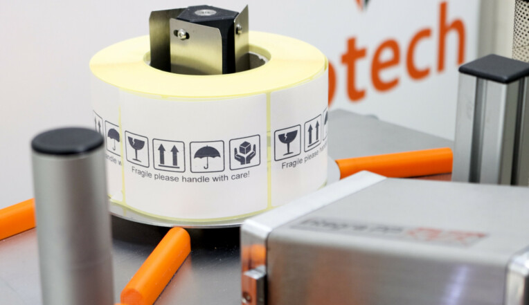 Large area coder printing onto labels