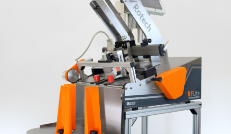 Sleeve and carton batch coding machine
