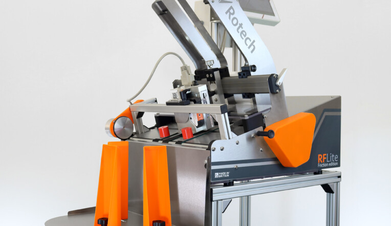 Sleeve and carton batch coding machine