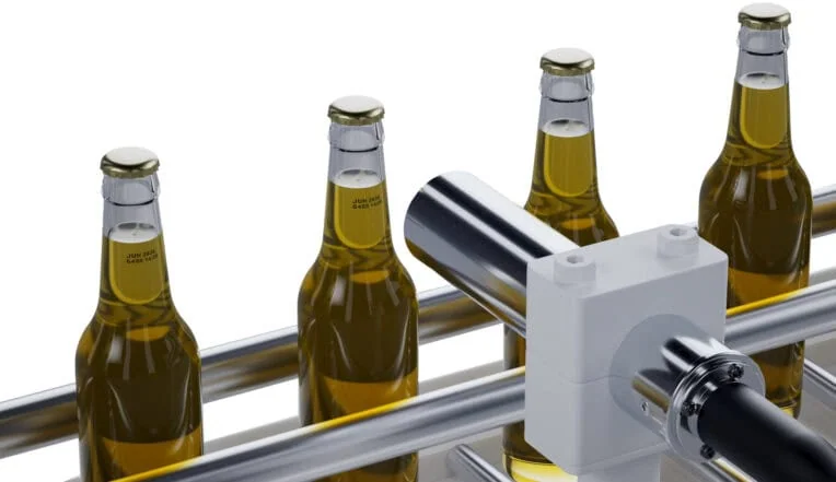 LEIBINGER CIJ printer, printing onto glass bottles