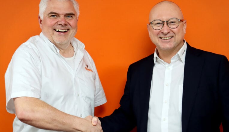 Richard Pether from Rotech and Tim from LEIBINGER shaking hands