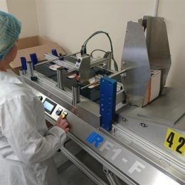 Operator using the RF1 friction to feed and print cartons