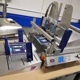 Cartons being fed and printed using RF2